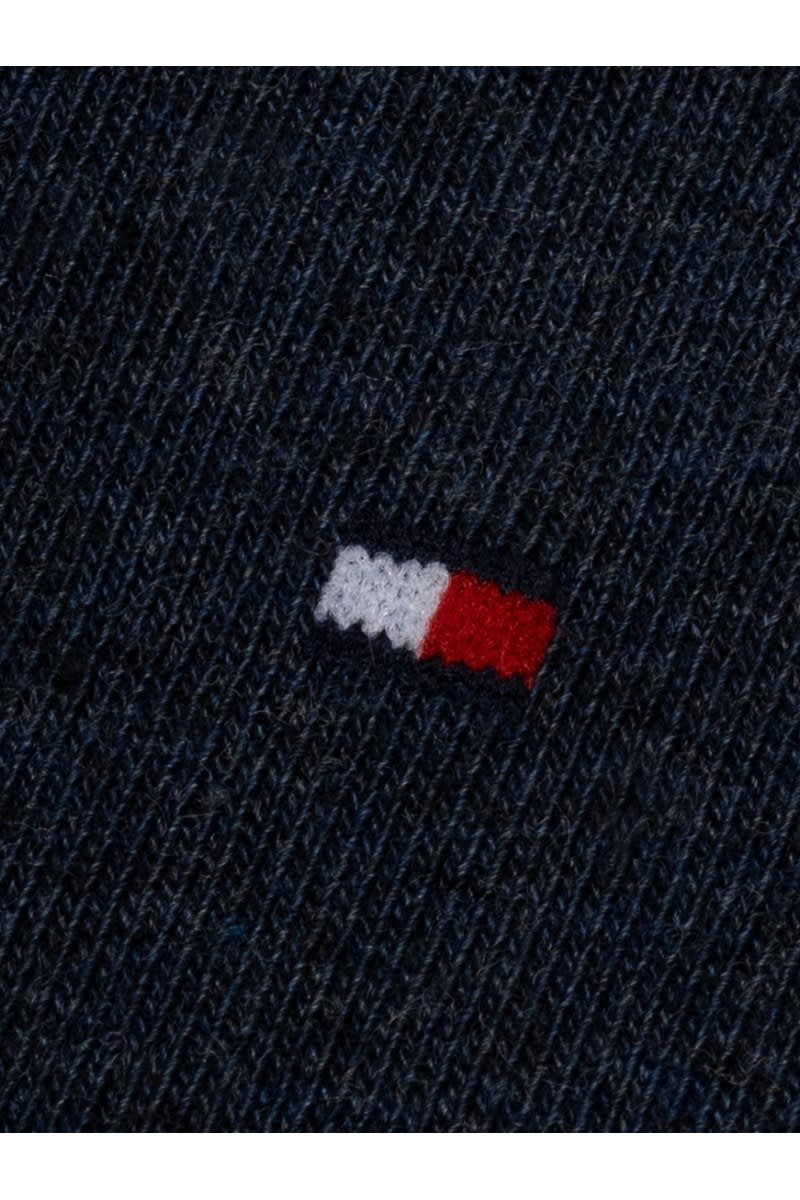 Close-up of the embroidered Tommy Hilfiger flag on the jeans blue classic sock