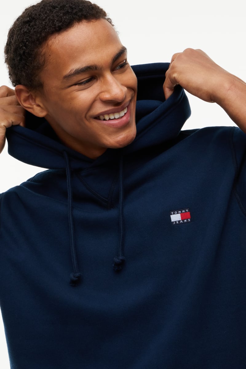 TJM Reg Badge Hoodie Aw26 - DK BLUE