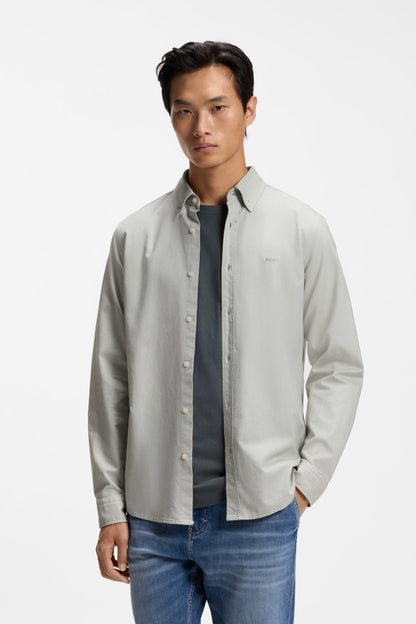 Model wearing the Boss Rickert button-down cotton shirt in open green